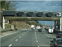 TQ1956 : Gantry and bridge over the M25 by JThomas