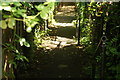 View down the stepped path leading from Archway Bridge down to Archway Road