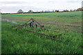 Old harrow by the edge of a field