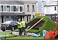 Constructing a Golf-themed flower bed on the traffic island at the junction of the Castlewellan and Belfast roads