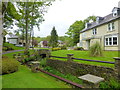 Brook runs through housing estate at Turton Bottoms