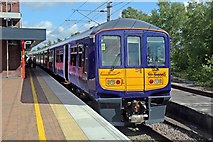 SD5805 : Northern Electric Class 319, 319380, platform 6, Wigan North Western railway station by El Pollock
