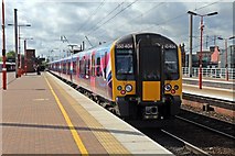 SD5805 : First TransPennine Express Class 350, 350404, Wigan North Western railway station by El Pollock