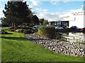 SX9289 : Landscaping to a used car showroom, Matford Trading Estate, Exeter by Robin Stott