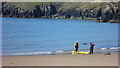 SH1629 : Paddlers on Porth Oer on Lleyn in May by Jeremy Bolwell