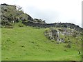 Drystone wall climbing a hillside