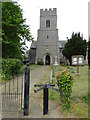 Turnstile at the gates of Wicklewood church