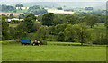 A tractor poses in front of Dusty Clough Wood