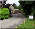 SLOW CHILDREN ANIMALS sign at the edge of Windmill Road, Kemble