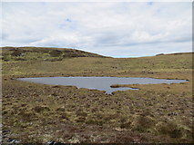 NC6341 : Small hill loch below Cnoc Bad na Gallaig by John Ferguson