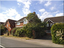 SU7667 : Houses on School Road, Arborfield Cross by David Howard