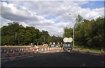 SU8866 : Cones at the junction of A322 and Nine Mile Ride, Bracknell by David Howard