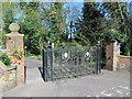 Ornamental gates at the entrance to The Warren off Port Hill, SG14