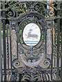 Coat of arms on the ornamental gates at the entrance to The Warren off Port Hill, SG14