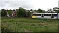 Metrolink tram passing through Radcliffe