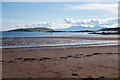 Looking over the sand in Kames Bay towards Little Cumbrae and Arran