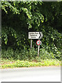 Roadsign on the B1121 Main Road