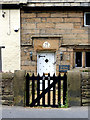 Doorway to number 25 Little Crosby Village