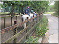 TQ2281 : Riders at Wormwood Scrubs Pony Centre by David Hawgood