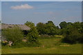 Barn amid trees at Stretton Heath level crossing