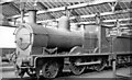 SU1484 : GW (ex-M&SWJ) 2-4-0 in Swindon Stock-shed, 1953 by Ben Brooksbank