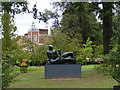 A family portrait in stone by Henry Moore, exhibited in the garden at Hatfield House