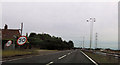 Approaching power lines crossing A38