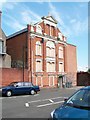 The boarded up rear of the Clifton Street Orange Hall