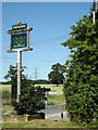 TM1070 : The Four Horseshoes Public House sign by Geographer