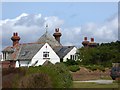 SX5347 : The chimneys of Battery Cottage by David Smith