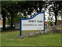 TG2115 : Abbey Farm Commercial Park sign by Geographer