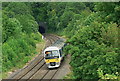 Chiltern Railways diesel unit leaving the west portal of White House Farm Tunnel