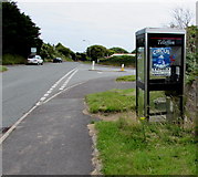 SS0198 : Circus advert on a BT phonebox, Freshwater East by Jaggery