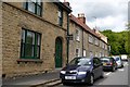 Hairdresser and houses in Whitby Gate, Thornton-le-Dale