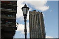 View of one of the Barbican Towers and a lamp post sizing themselves up alongside Andrewes House