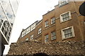 View of a segment of the London Wall and the rear of buildings on Savage Gardens from the rear of the Grange City Hotel #2