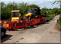 Yellow machines alongside the road from Bridstow to Peterstow