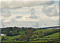 Upcott House and turbines on Fullabrook Wind Farm