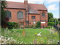 Garden alongside St James with Holy Trinity