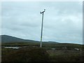 NF8973 : Power line next to Loch Portain Road by Stephen Darlington
