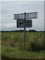 TM1470 : Roadsign on the B1077 Castle Hill by Geographer