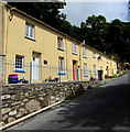 Yellow row of three cottages, New Hill, Goodwick