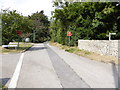 Looking west on Church Road past footpath junction