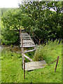 Dilapidated footbridge at Megdale