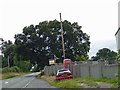 Phone box and a Rover car alongside B5106