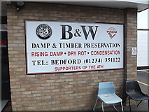 TL0652 : B & W Damp & Preservation sign by Geographer