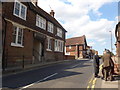 Pedestrians chatting in the High Street