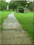 SE2435 : St Peter's Bramley: graveyard paths by Stephen Craven