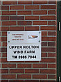 TM3979 : Upper Holton Wind Farm sign by Geographer