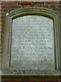 Plaque on the tower of St Mary the Virgin Churchyard, Stansted Mountfitchet